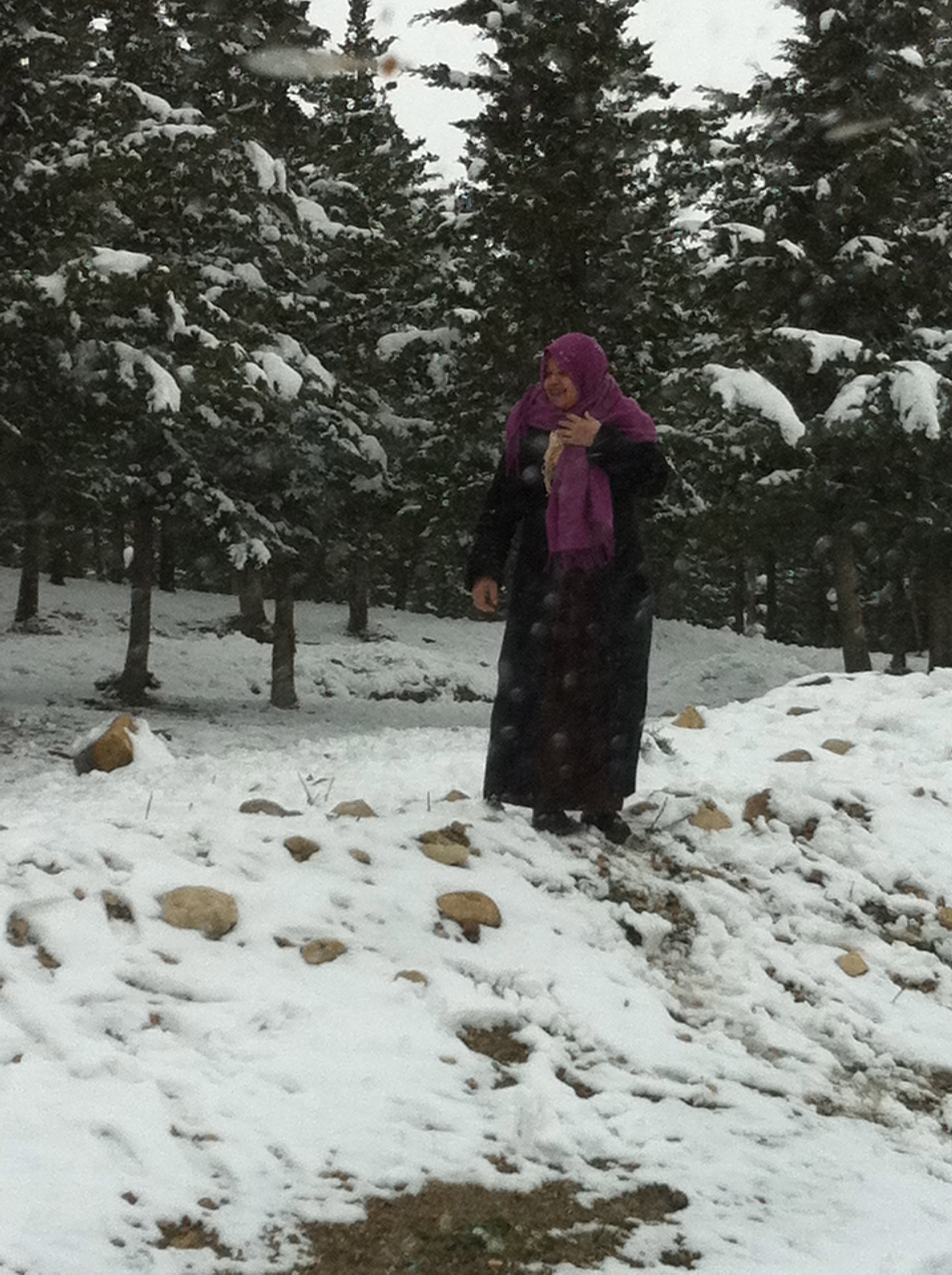 tunisian woman standing in snow