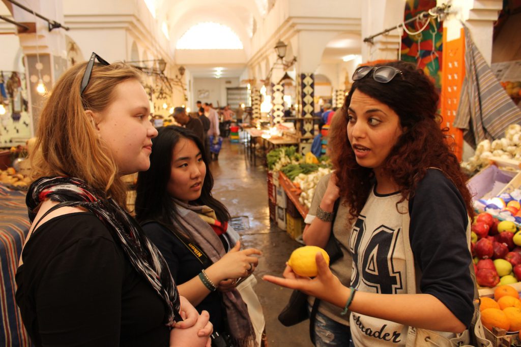 Travelers learn about life in the Sousse Medina at a local souq
