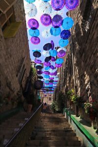 umbrellas covering a street in Amman Jordan